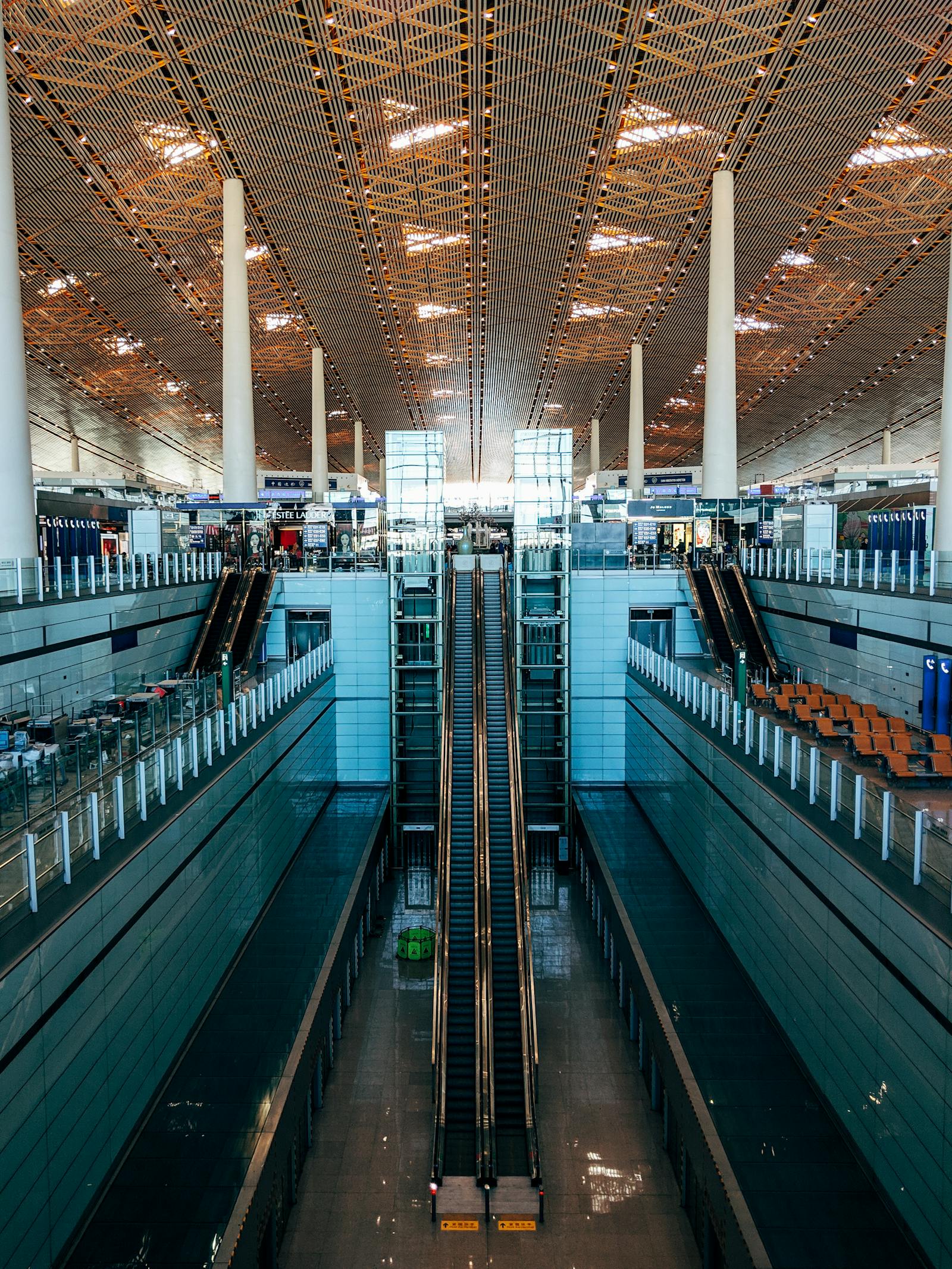 Beijing Capital International Airport terminal exterior with the curving roof of Terminal 3