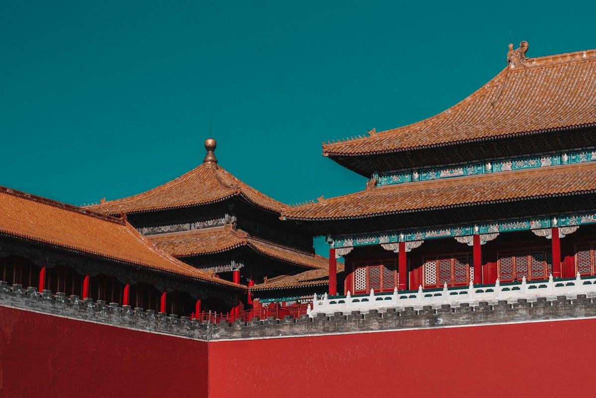 The yellow-tiled roofs and red walls of the Forbidden City viewed from Jingshan Park
